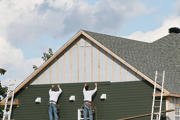 Professional Siding Installation technician working in Fort Belvoir, VA